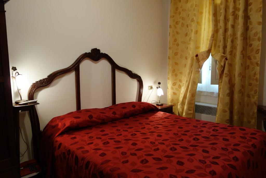 Hotel Roma Скано Стая снимка