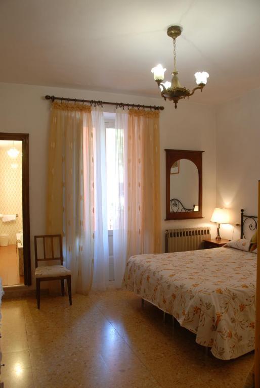 Hotel Roma Скано Стая снимка